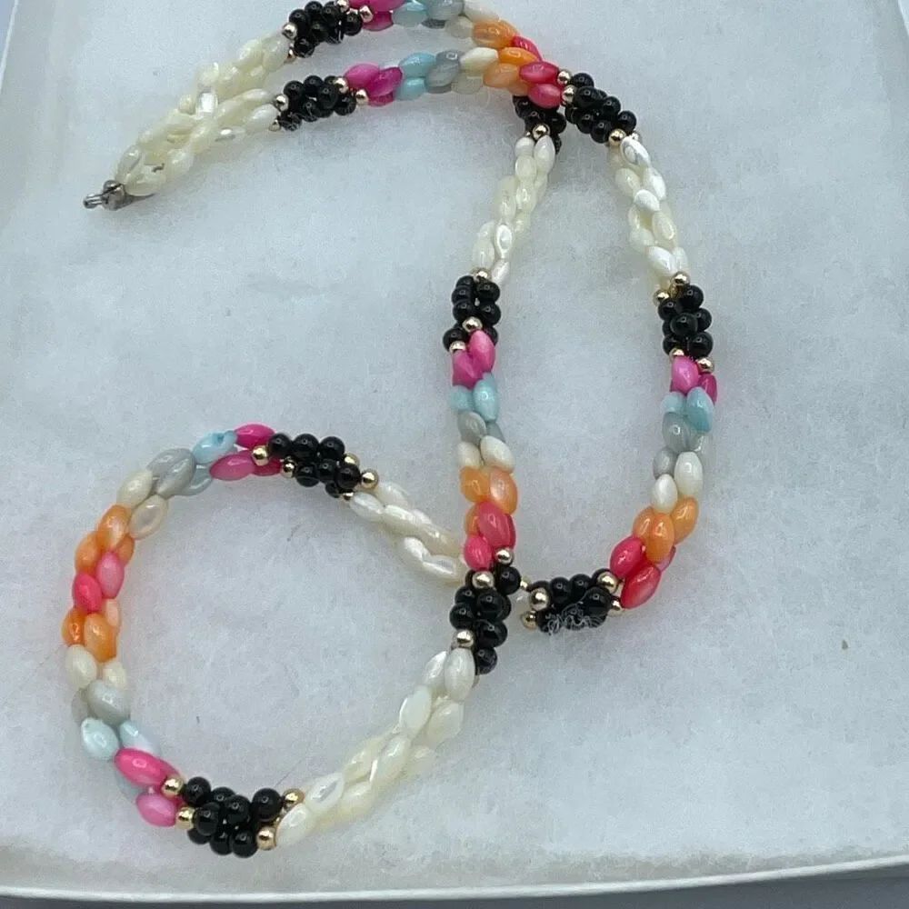 Vintage double strand black onyx mother or pearl necklace.